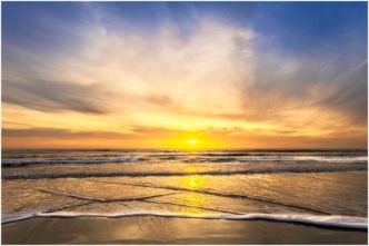 Sunset Over Widemouth Bay Cornwall framed print by Paul Haddon