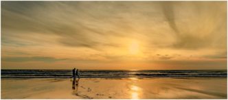 Sunset Photograph Widmouth Bay Cornwall Framed Print by Paul Haddon
