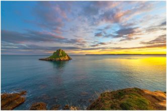 Evening Light Over Thatcher Rock Torquay Signed Limited Edition Framed Print by Paul Haddon